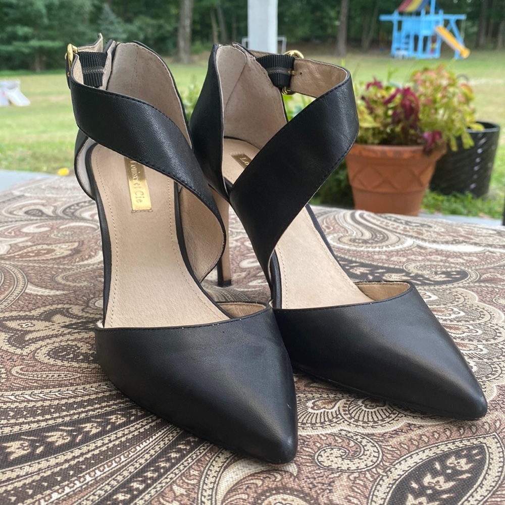Asymmetrical strap heels